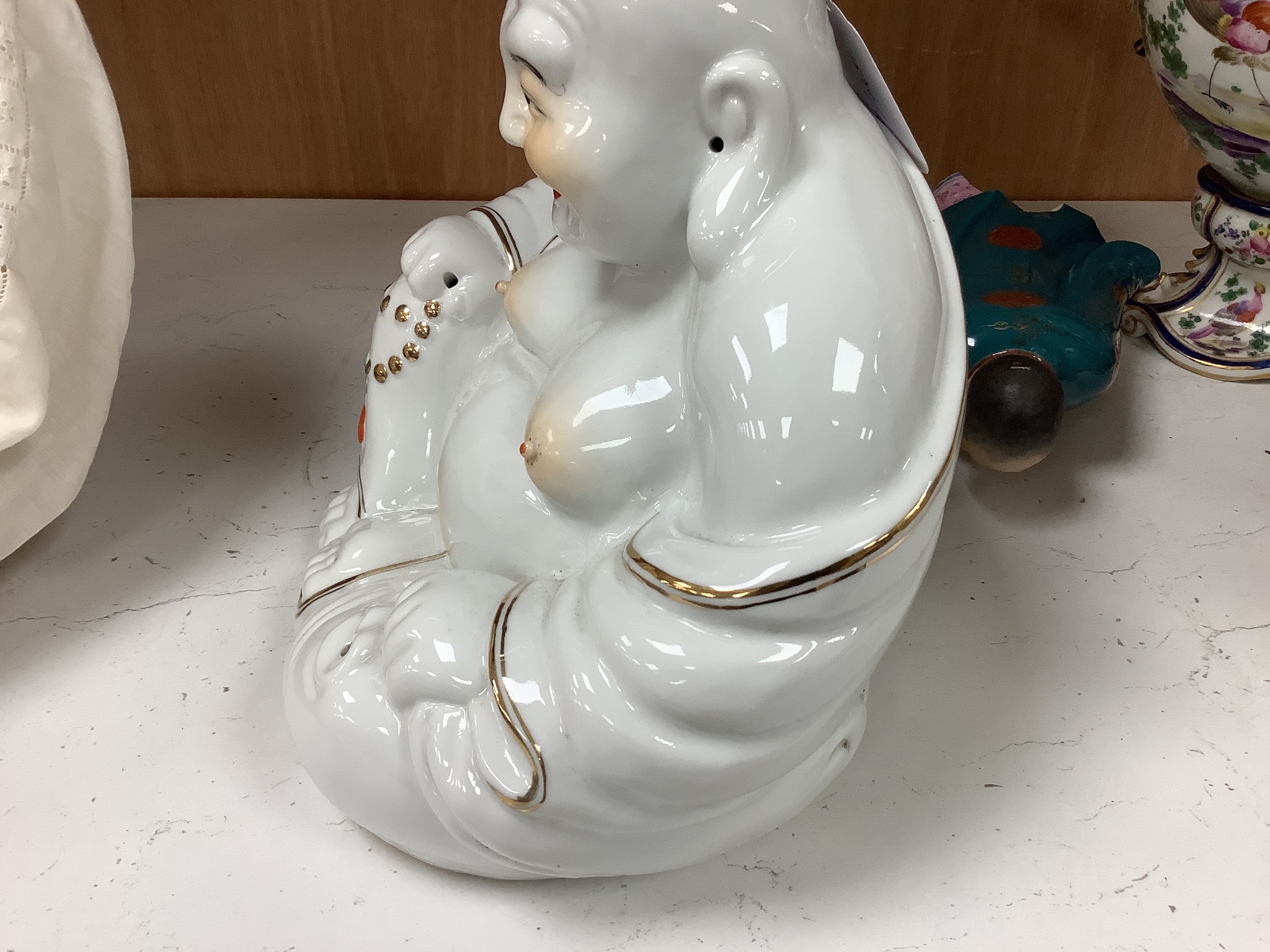 Two Chinese porcelain figures of Budai, tallest 23cm